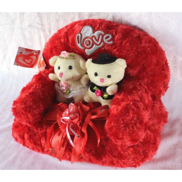 Valentine Love Couple Teddy Bears sitting on a plush Sofa